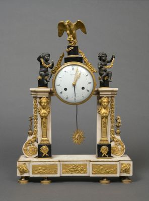 a clock that is sitting on top of a table