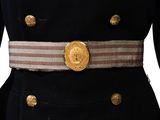 an image of a military uniform with gold buttons and a belt