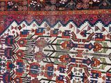 an image of a large oriental rug on display on a floor