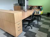 an image of an office with a desk and two chairs