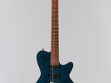 an electric guitar hanging from a ceiling in a room