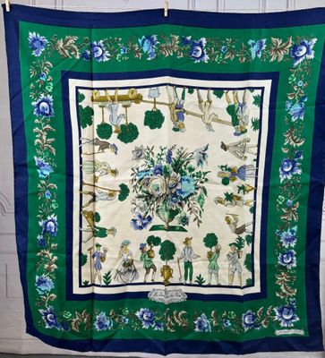 a blue and green scarf hanging on a wall next to a door