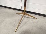 an image of a table with a lamp on top of it