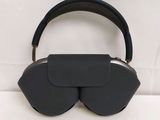 an image of a pair of black eye masks on top of a white surface