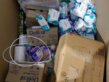 a box full of toilet paper and other items in it