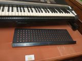 a keyboard and a keyboard pad on a table