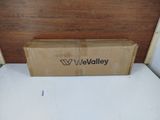 a box of well valley wine sitting on top of a white floor