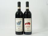 deux bouteilles de vin rouge posées l'une à côté de l'autre sur une table