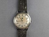 an image of a wrist watch with roman numerals on it