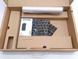 a box with a keyboard and a mouse inside of it