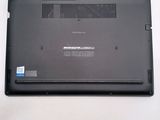 a laptop that is sitting on a white surface