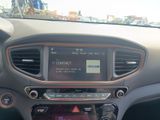a car dashboard with a digital display in the center