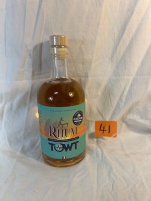 a bottle of rum that is sitting on a table
