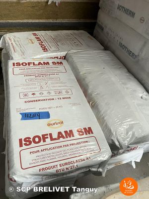 two mattresses in the back of a truck that is being loaded