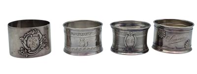 three silver metal cups are lined up next to each other