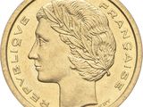 une image montrant un gros plan d'une pièce de monnaie à l'effigie d'une femme