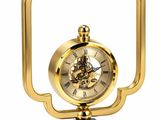 golden clock in a square frame on a white background