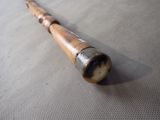 a baseball bat that is laying on the ground