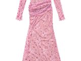 the dress is pink and has long sleeves and flowers on it