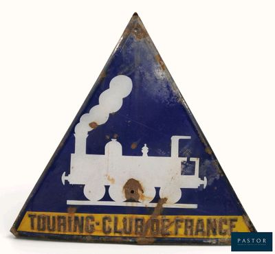 un panneau triangulaire sur lequel figure un train