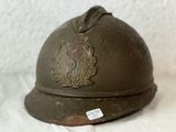 an old military helmet with a lion on the side of it