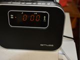 a clock that is sitting on top of a table