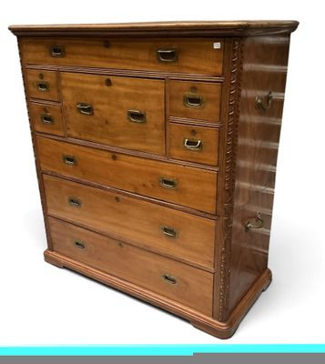 an image of a wooden chest of drawers on a white background