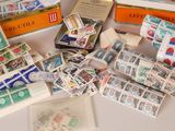 many different types of stamps on the table