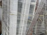 a large stack of boxes sitting on top of a pallet