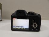 a digital camera that is sitting on a table