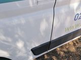 a van that is parked on the side of the road