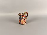 a small vase that is sitting on a table