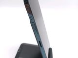 a close up of a cell phone on a stand