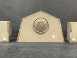 three pieces of art deco in the shape of a house