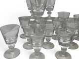 a lot of empty wine glasses on the table