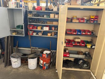 a storage area with a lot of tools on the shelves