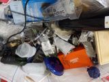 a pile of assorted items that are on a table