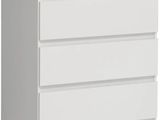 a white chest of drawers with three drawers on each side