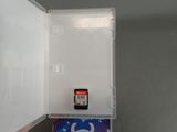 a small plastic box with a cell phone inside of it
