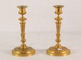 pair of antique brass candlesticks with green glass top