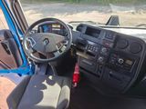 a car dashboard with a steering wheel and a dash board