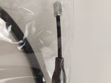 a close up of a black cable in a plastic bag