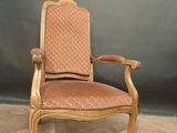 a wooden chair with a pink upholstered upholstered upholstered upholstered upholstered upholstered upholstered upholstered
