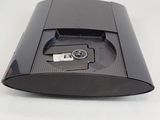 an image of a black electronic device on a white surface