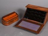 a small wooden box with a mirror inside of it