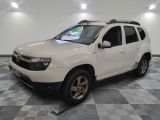 a picture of a white dacia parked in a garage