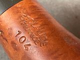 a close up view of a leather shoe with a rubber sole