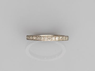 a white gold wedding band with diamonds