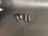a close up of a metal object on a metal surface