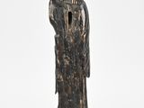 an image of a statue of a woman in a long dress